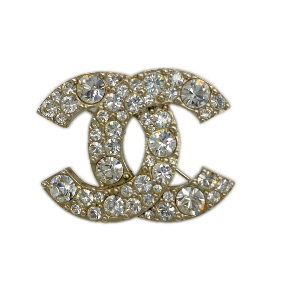 CHANEL Silver Logo Brooch